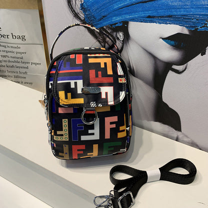 Crossbody taske med nylon print